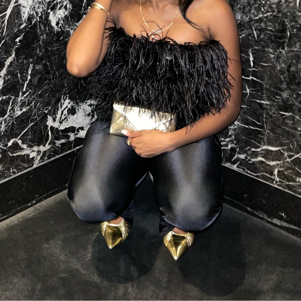 2 piece set. Feather top with pants